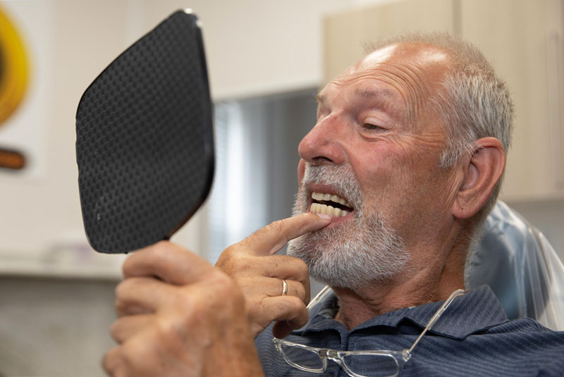 implant patient after makeover