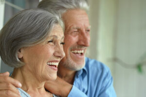 full-mouth-reconstruction dental patients smiling.